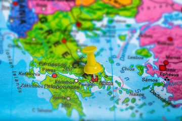 Athens in Greece pinned on colorful political map of Europe. Geopolitical school atlas. Tilt shift...