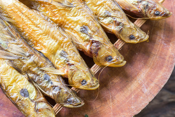 Dried fish on wooden