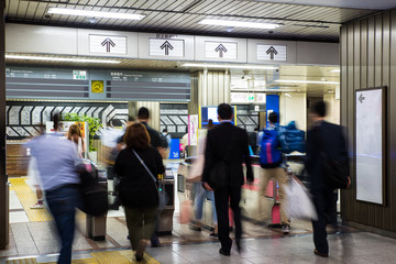 Blurred crowd of people at metro station in Tokyo,  Japan. Metro