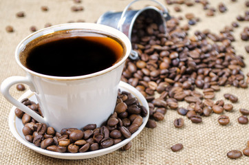 cup of coffee with beans