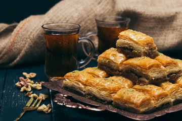  traditional eastern desserts on wooden background