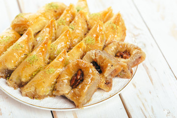  traditional eastern desserts on wooden background