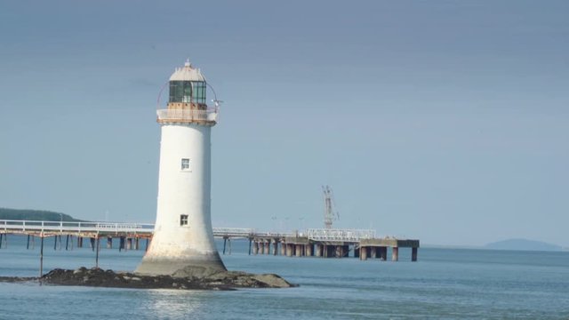 The white lighthouse in the river in Killimer the old lighthouse in the middle of the river