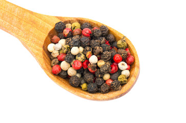 Spice in spoon on white background