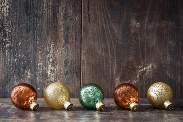 Christmas balls on wooden background


