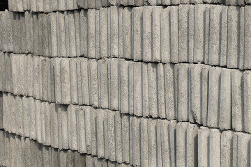 Many gray brick/concrete block texture background. a lot of overlap material prepare to built.