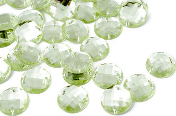 Light-green rhinestone on white background