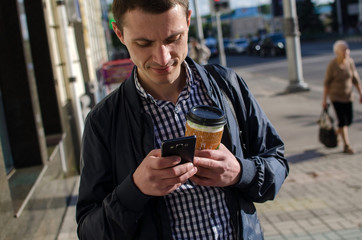 Young man using his phone