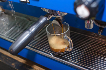 Aged man making coffee