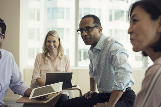 Business people in meeting having interesting discussion