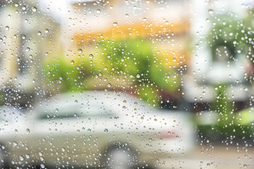 abstract scene of water drop on glass in rainy day