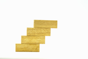 Pile of wooden blocks in stair style on isolate