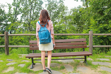 Portrait of the beautiful asian girl alone in the garden,soft fo