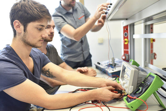 Technical instructor teaching students
