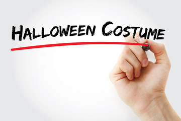 Hand writing Halloween costume with marker, concept background