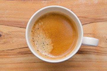 Italian hot coffee on wood table