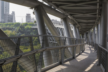 Tabiat steel bridge connects two public parks by spanning the Modarres highway in northern Tehran.