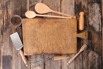 chopping board with kitchen utensil