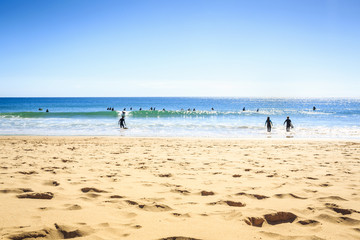 Surfers on Beliche Beach, Sagres, Algarve, Portugal