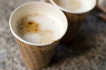coffee in the plastic cup on the table