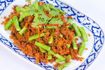 Stir fried crispy pork belly and red curry..
