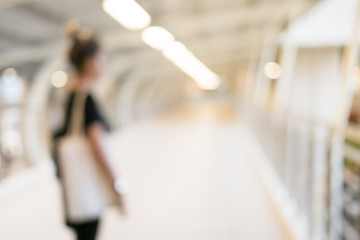 woman walk through pathway under neon light, way to success, blurred