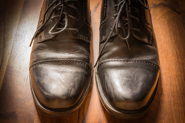 Black Leather Dress Shoes Worn Wooden Floor Sunlight Spotlight S