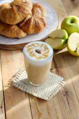 Latte and french croissant