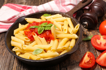 pasta with tomato sauce and basil