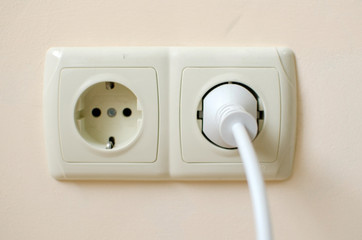 Two plugs in the wall 