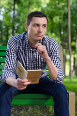 Obraz premium Young man making notes