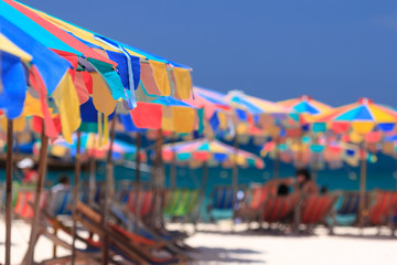 Beach chairs and parasol on Koh Khai island. Phuket, Thailand.