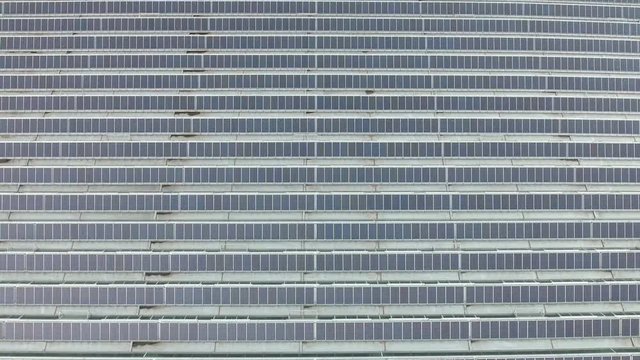 Power plant using renewable solar energy with sun. Aerial view.