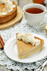 apple pie decorated with whipped cream