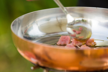 Detail of cooking meat