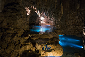 Okinawa, Japan - October 21, 2016: Gyokusendo Stalactite cave in Okinawa island, Japan. The cave was formed approximately 300,000 years ago and has 5000 meter long