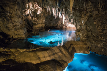 Okinawa, Japan - October 21, 2016: Gyokusendo Stalactite cave in Okinawa island, Japan. The cave was formed approximately 300,000 years ago and has 5000 meter long