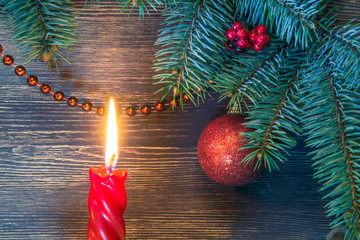 Christmas tree with glowing candle and blue highlight