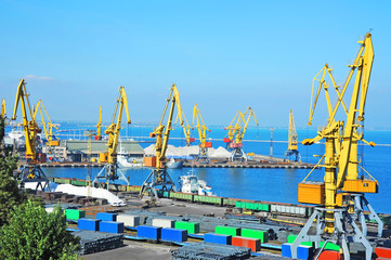 Fototapeta na wymiar Port cargo crane and railroad
