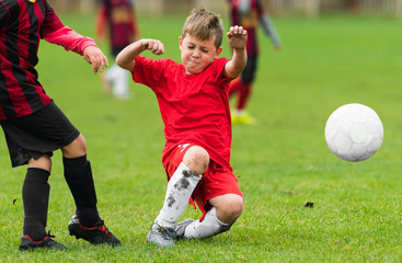  Boys kicking ball