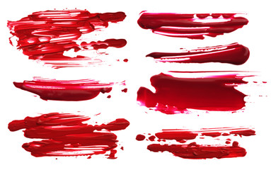 Red abstract acrylic color brush strokes blots. Isolated.
