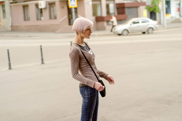 Young girl walking in the city