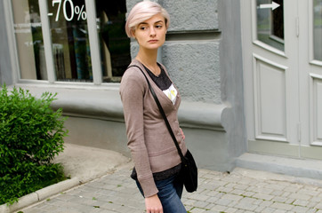 Young girl walking in the city