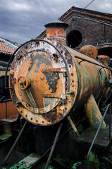 Plakat Rusty steam locomotive in the station of Turin Ponte Mosca (Italy), repair workshop for old trains