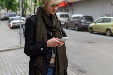 Young girl using her phone