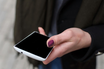Young girl using her phone
