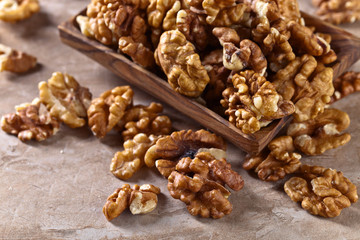 Walnuts in old wooden dish