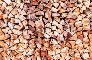 Stacked firewood background texture