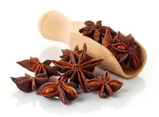 Heap of star anise isolated on white