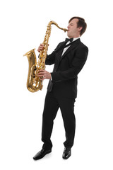 Saxophonist in a tuxedo plays music on sax.